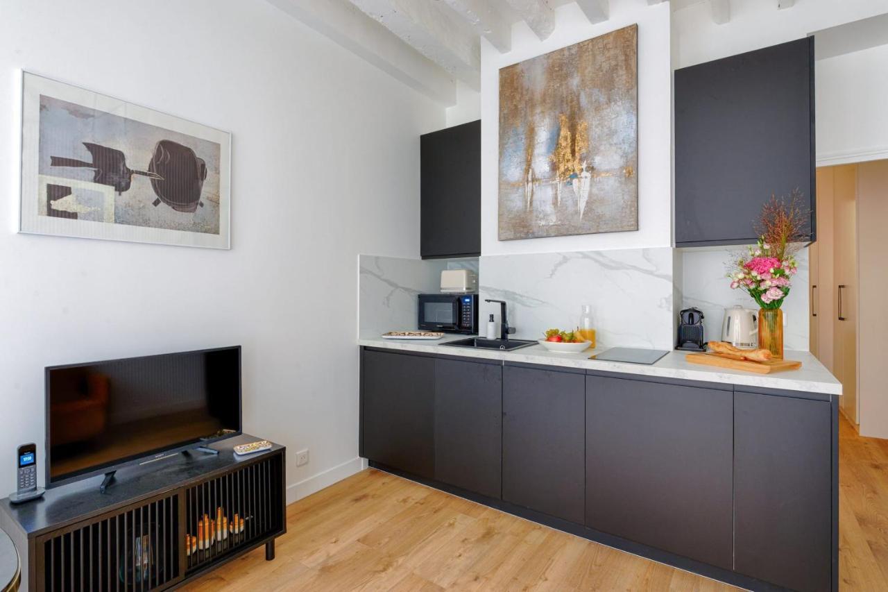 Appartement Design Ile St Louis - Welkeys ปารีส ภายนอก รูปภาพ