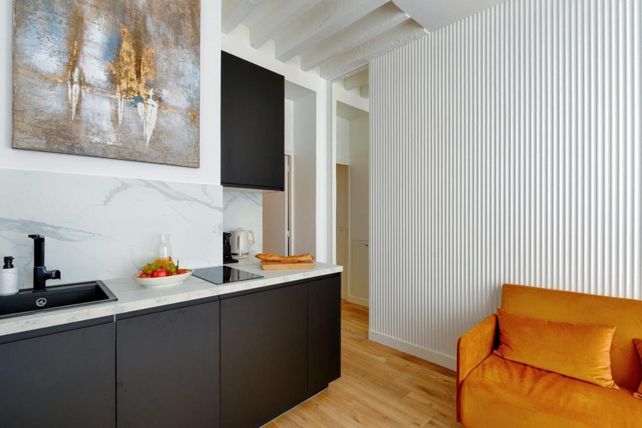 Appartement Design Ile St Louis - Welkeys ปารีส ภายนอก รูปภาพ