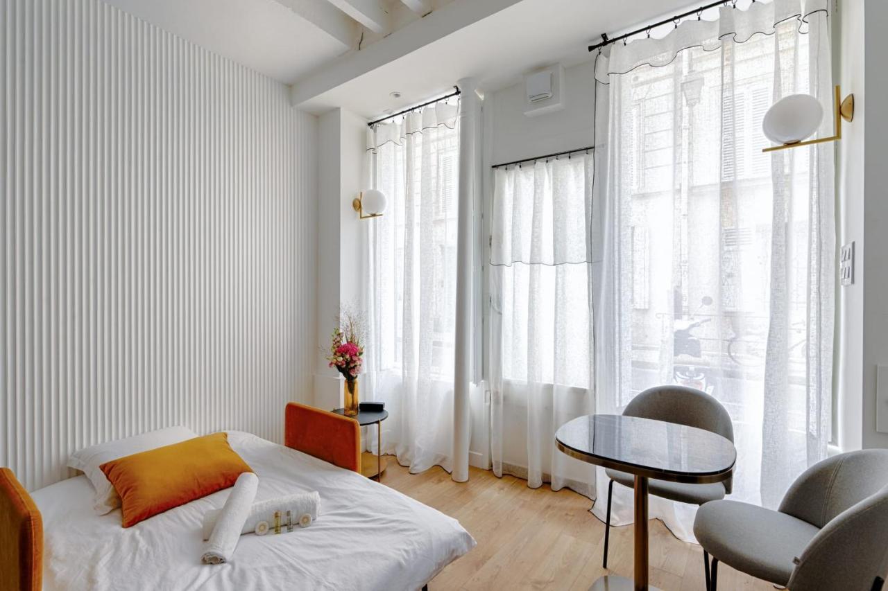 Appartement Design Ile St Louis - Welkeys ปารีส ภายนอก รูปภาพ