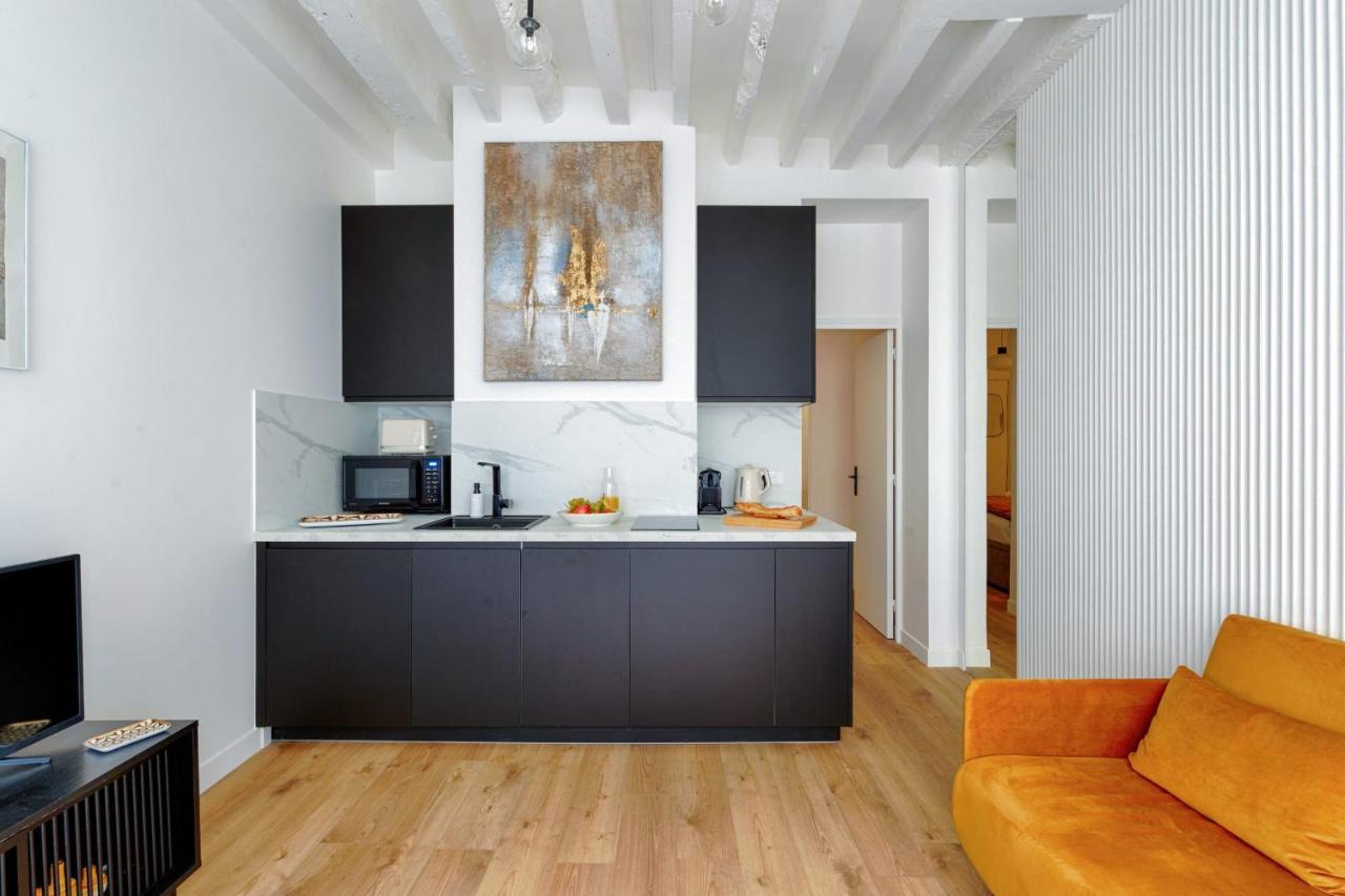 Appartement Design Ile St Louis - Welkeys ปารีส ภายนอก รูปภาพ